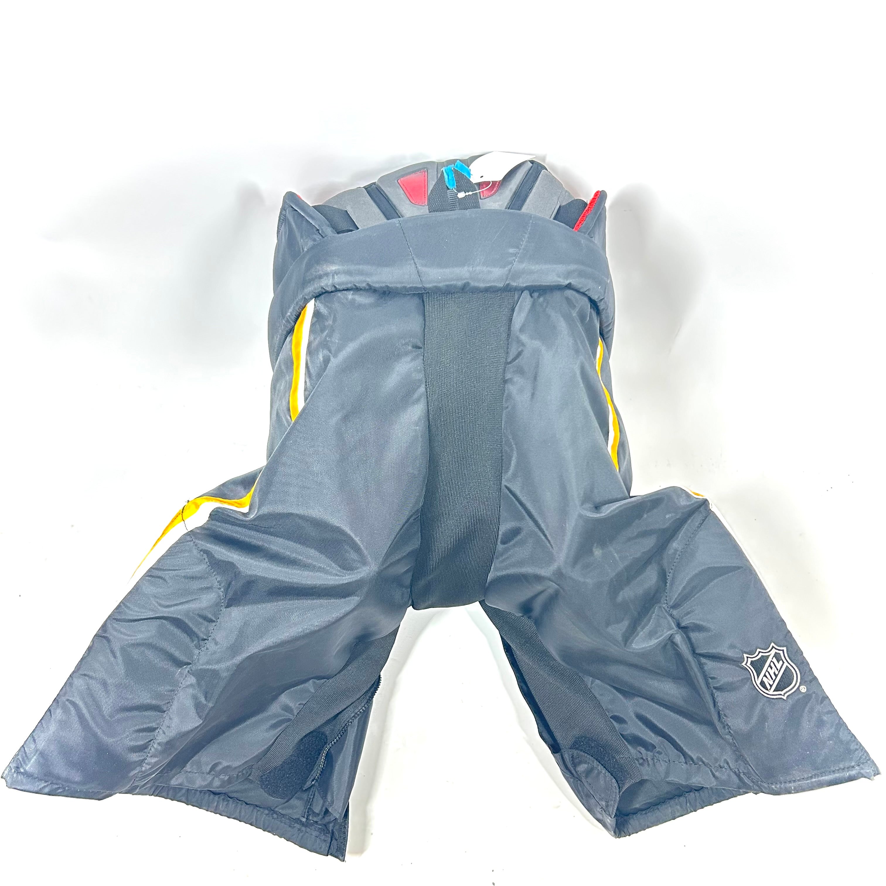 Pantalon de survêtement professionnel d'occasion de la LNH – CCM HP45 – Flames de Calgary (noir/jaune/blanc)